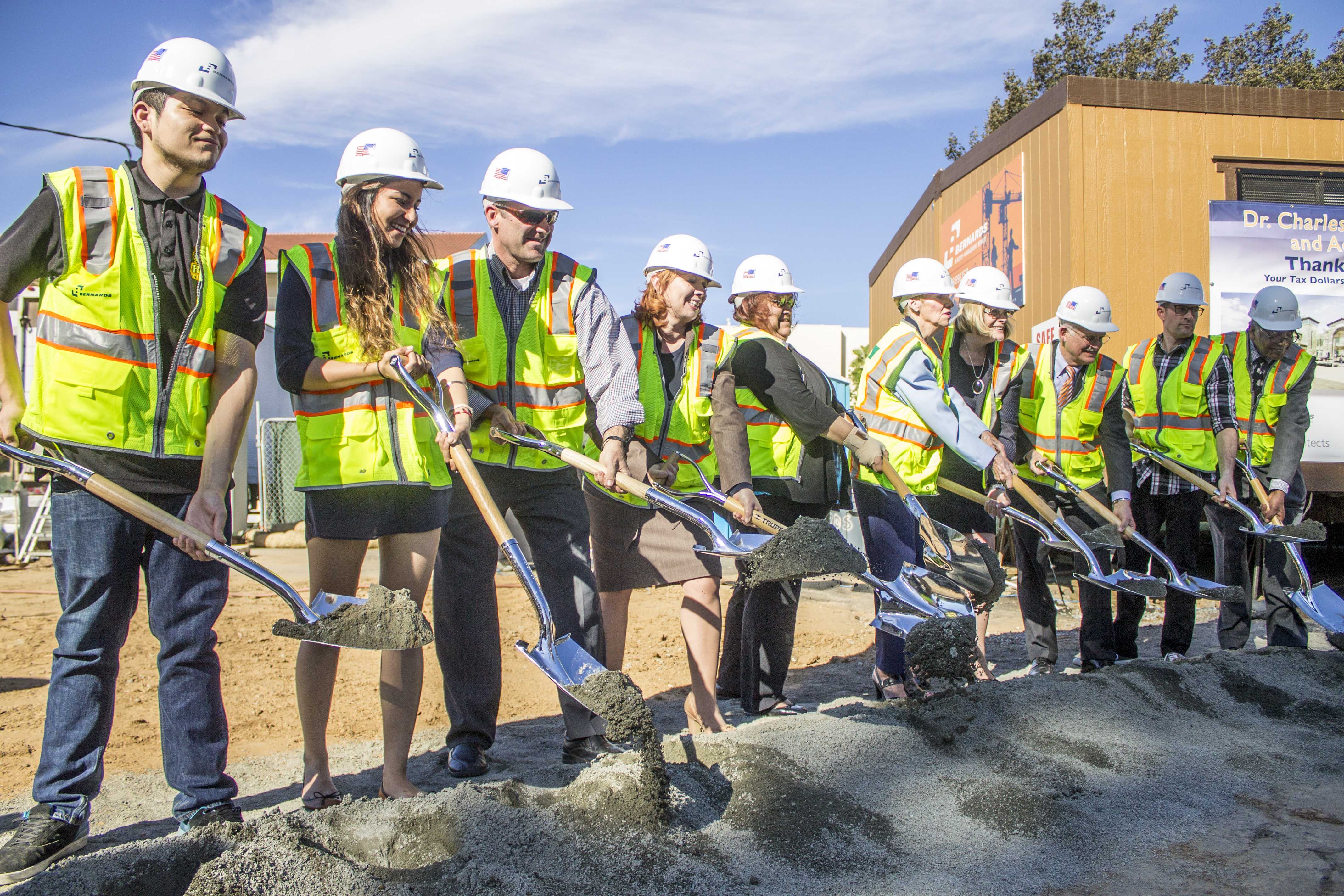 Ray Orozco, ASRCC president, Ravneet Kaur, student senator of CCCBG, Rusty Bailey, mayor of Riverside, RCCD Board of Trustee members, Michael Burke, chancellor of RCCD, and Wolde-Ab Isaac, interim president of RCC break ground at the construction site of RCC's future Student Services and Administration building on March 13.