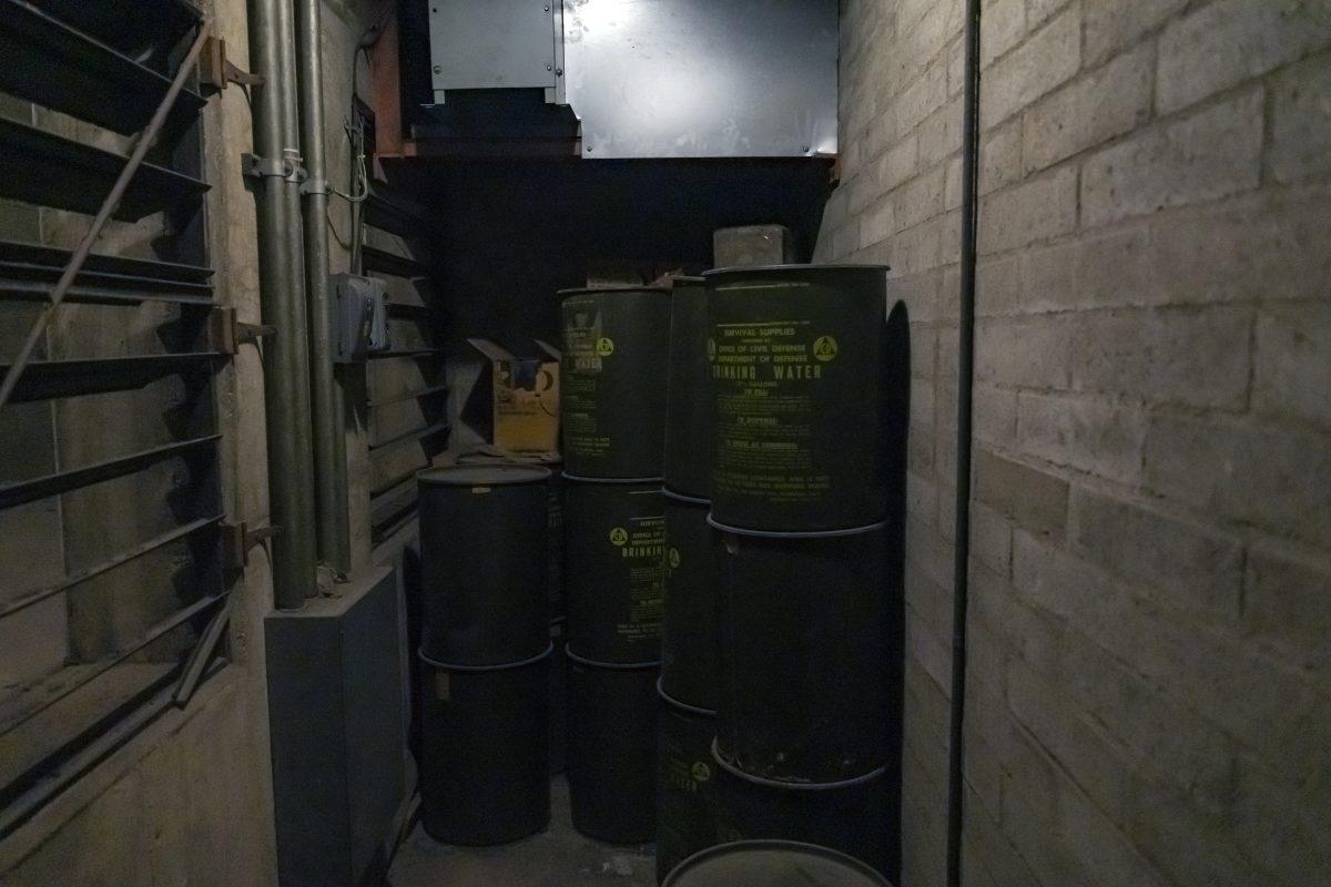 37.5 gallon drums of water line the fallout shelter, aka 'The Dungeon', in the basement of the Landis Performing Arts Center.  This is one of several spots in the theater that people have reported spooky occurances.

photo by Stephen Day, Viewpoints