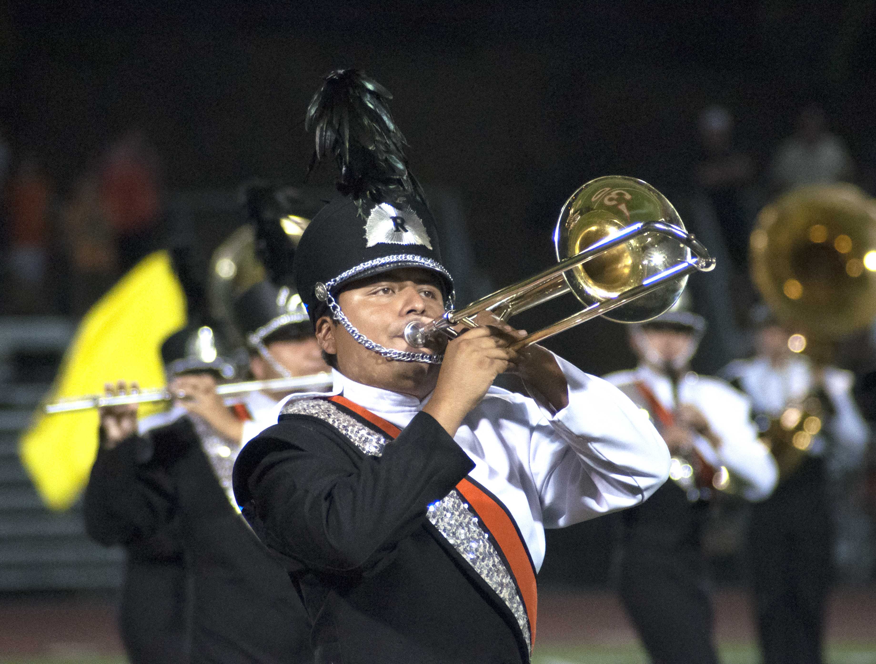 Big and Loud: The Marching Tigers display their fall production during halftime.