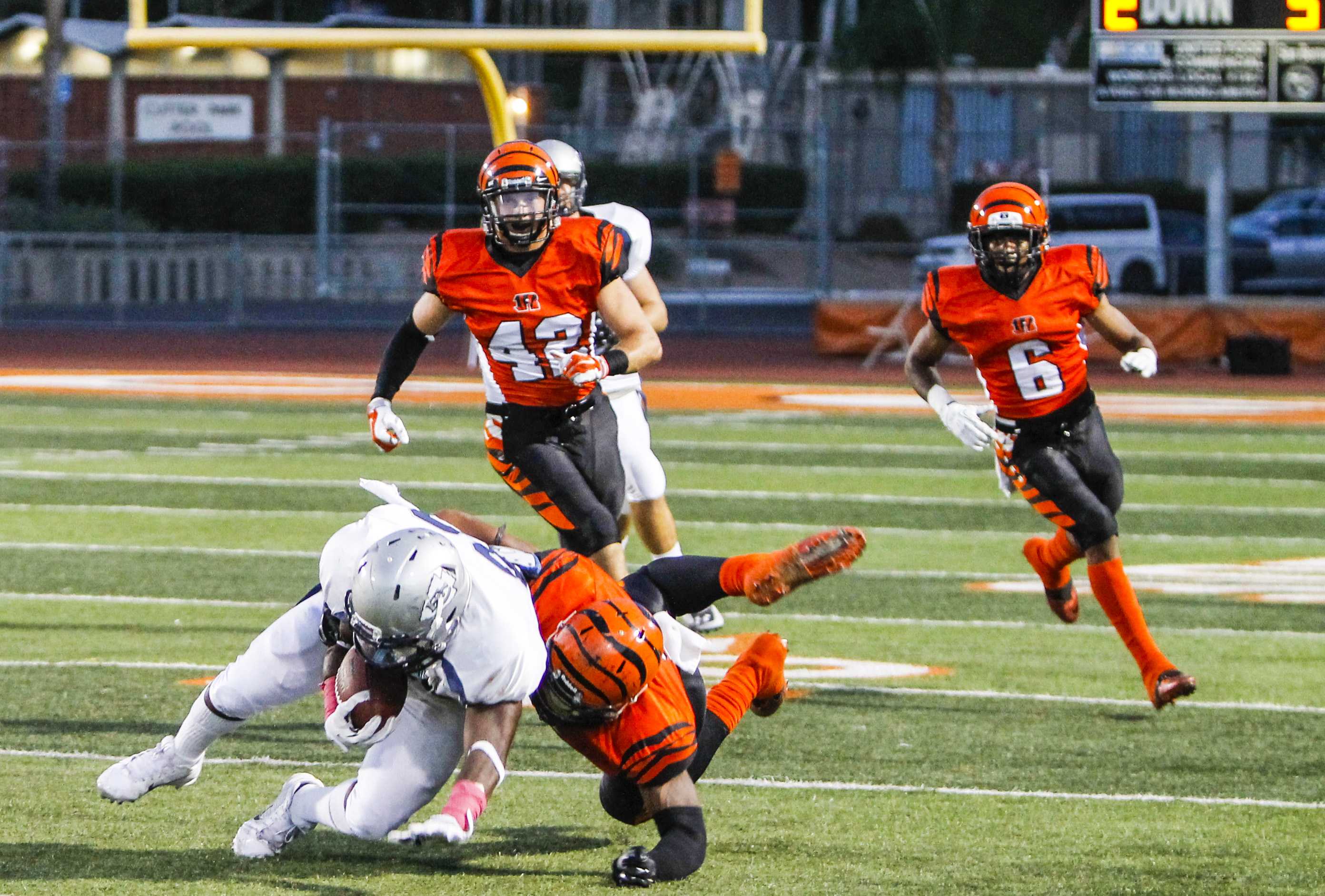 Luis Solis | Photo Editor Contender: Members of the Riverside City College defense swarm toward the El Camino Warriors’ ball carrier in the the Central League opener Oct. 4. RCC is 5-0 against league teams.