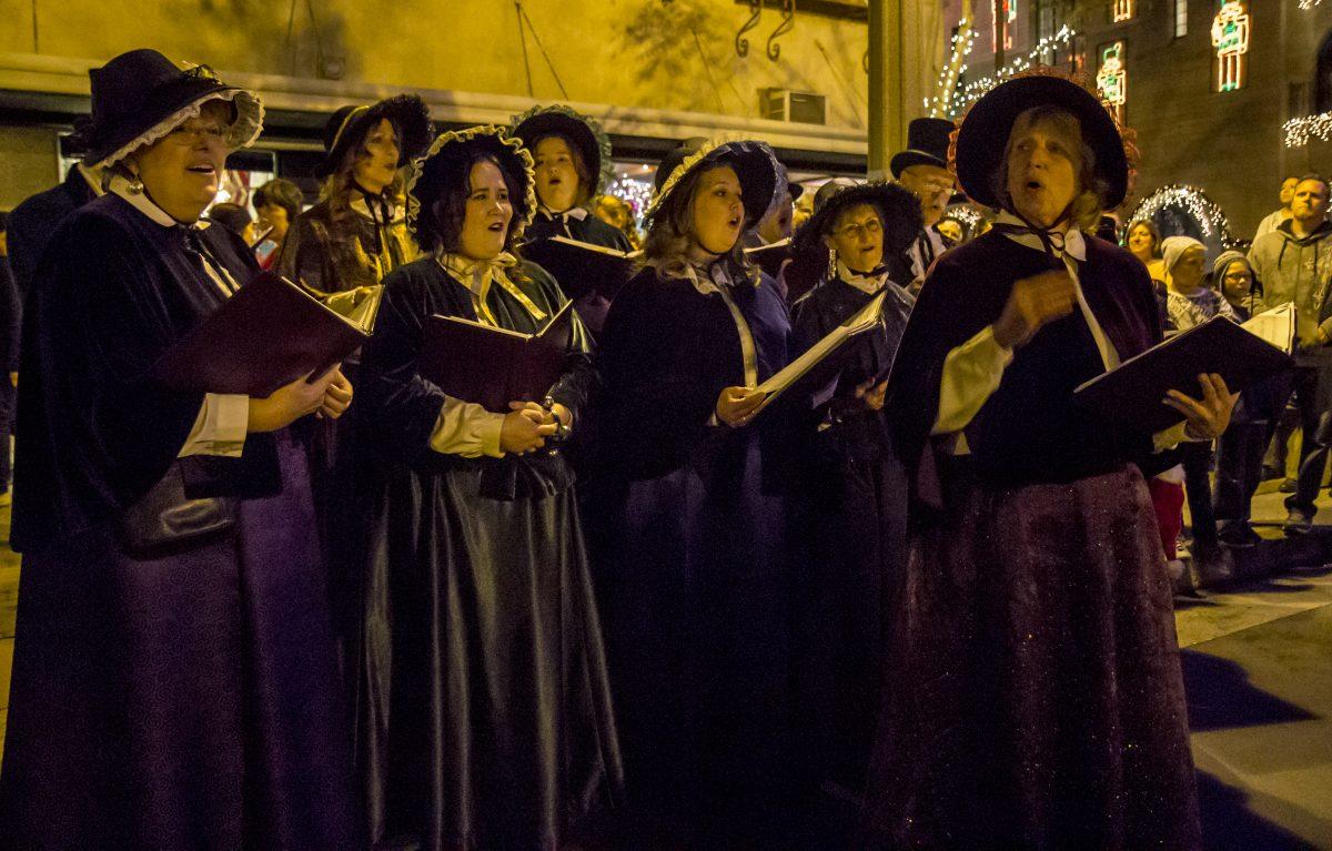 Carolers entertain attendees with many traditional Christmas songs such as Rudolph the Red Nose Reindeer (Luis Solis | Photo Editor)