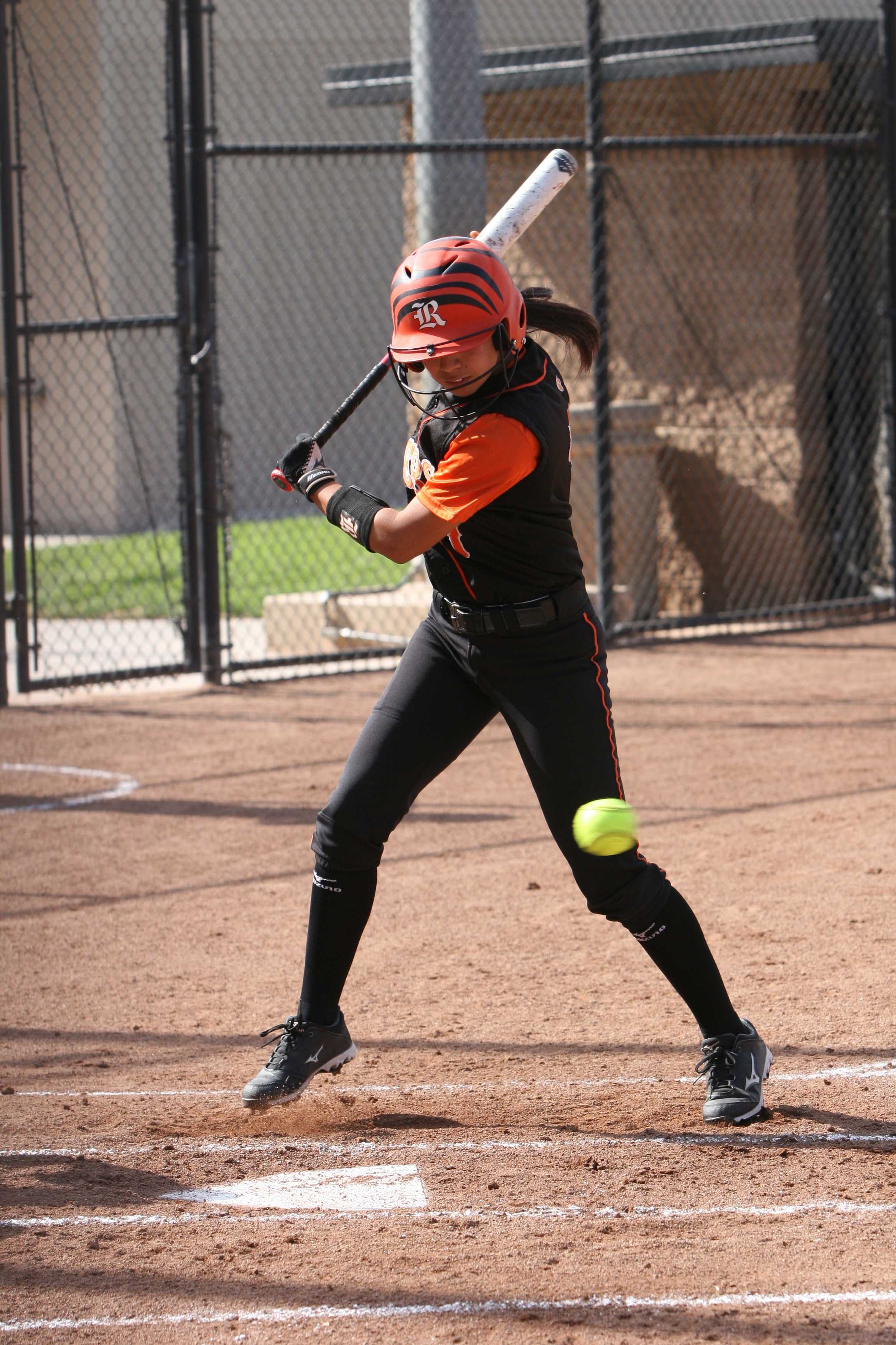 #7 Michelle Paul is at bat ready to swing in the Tigers' match against Cerritos College March 16