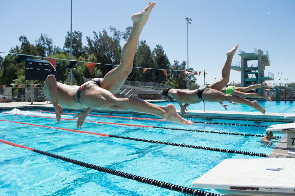 (Left to right) Riverside City College swimmers Justin Rohn, Daniel Ghomi, and Garret Shimko prepare for the CCCAA Championships at East Los Angeles College.