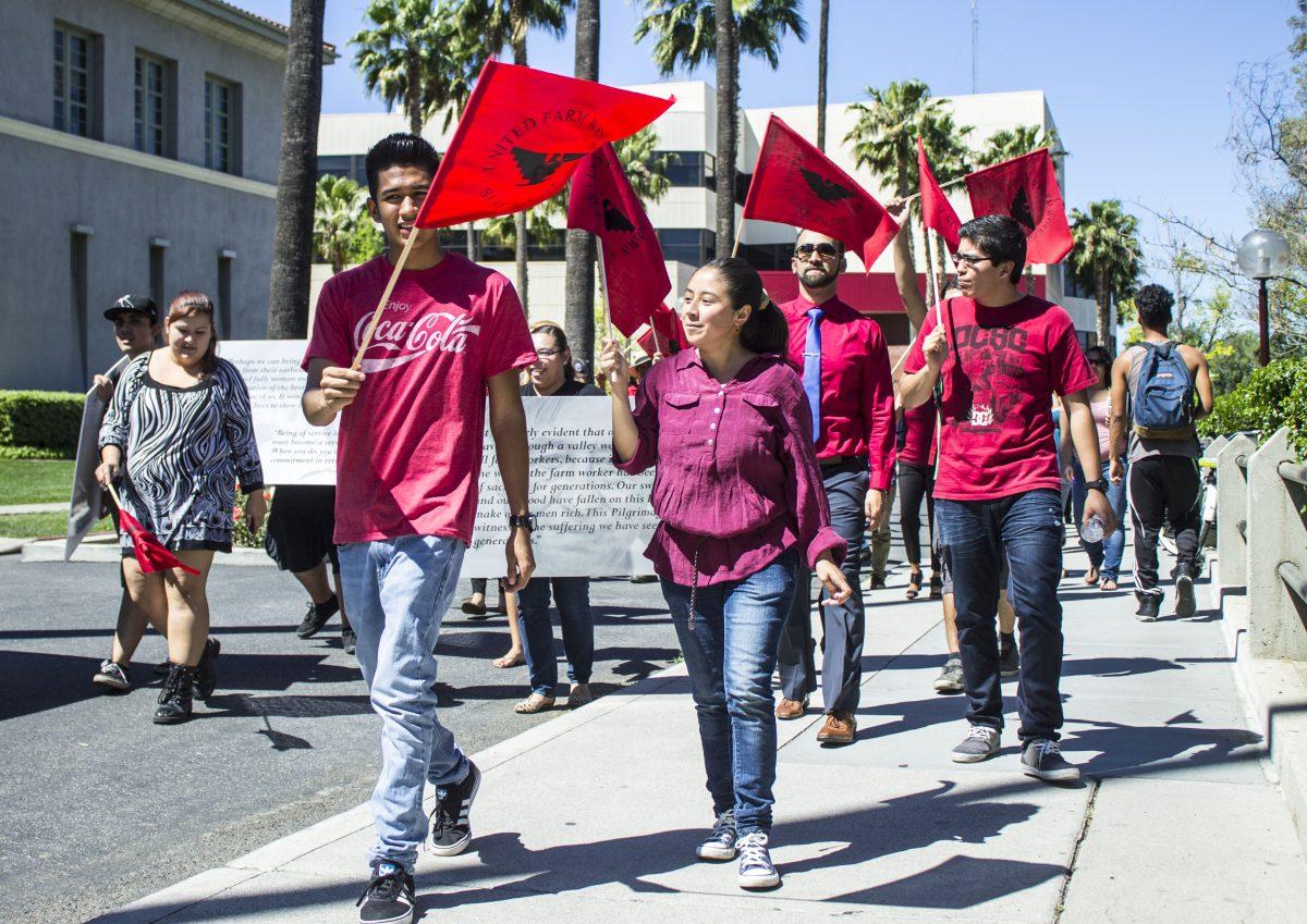 RCC students and staff members of the college march throughout the campus in support for Cesar Chavez day and the United Farm Workers.