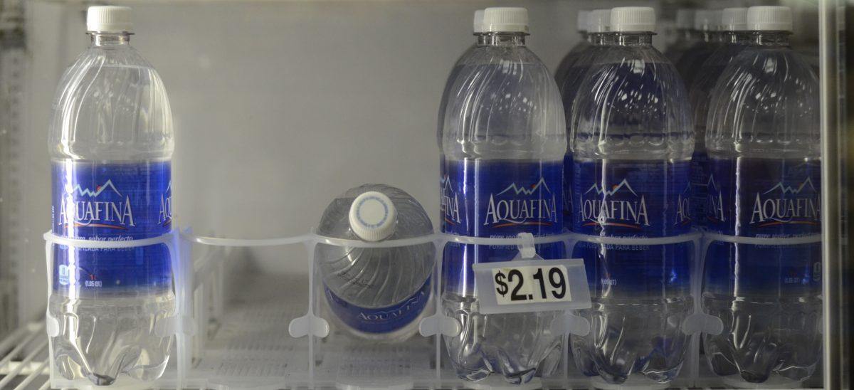 PHOTO ILLUSTRATION BY STACEY SORIANO

Refrigerated water for sale in the RCC Bookstore. According to Food and Water Watch, a nonprofit organization, a majority of cost of a water bottle goes to the packaging.