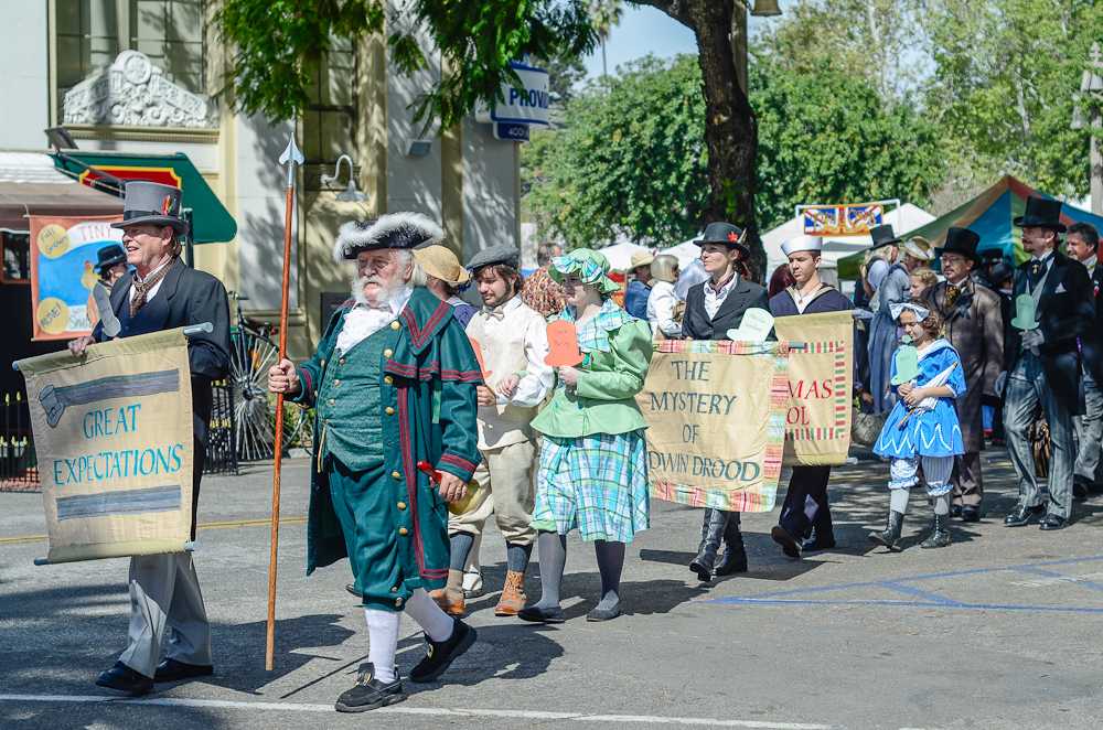 Dickens characters walk across Main Street during the Grand Parade for the start of the Riverside Dickens Festival which was held Feb. 27 and 28.