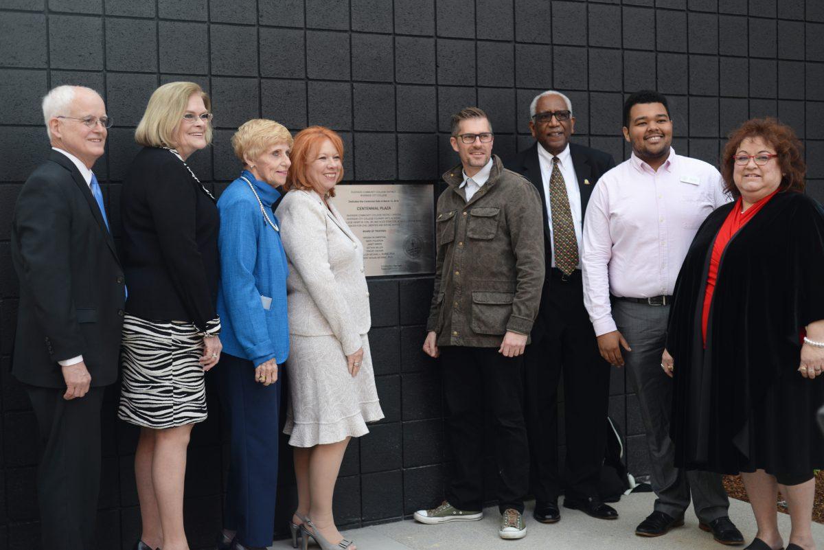 Riverside City College President Wolde-Ab Isaac, RCCD Chancellor Michael Burke and Board of Trustees commemorate  the opening of Centennial Plaza on March 13. Henry W. Coil, Jr. donated $5 million to fund programs at the Coil School for the Arts that were named after his parents.