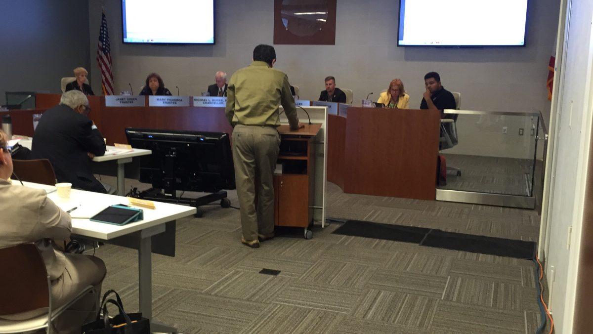 Riverside City College Faculty Association President, Dariush Haghighat shows his supports for student protesters at Riverside Community College District Board of Trustees meeting on May 3, 2016. (James H. Williams | Viewpoints)