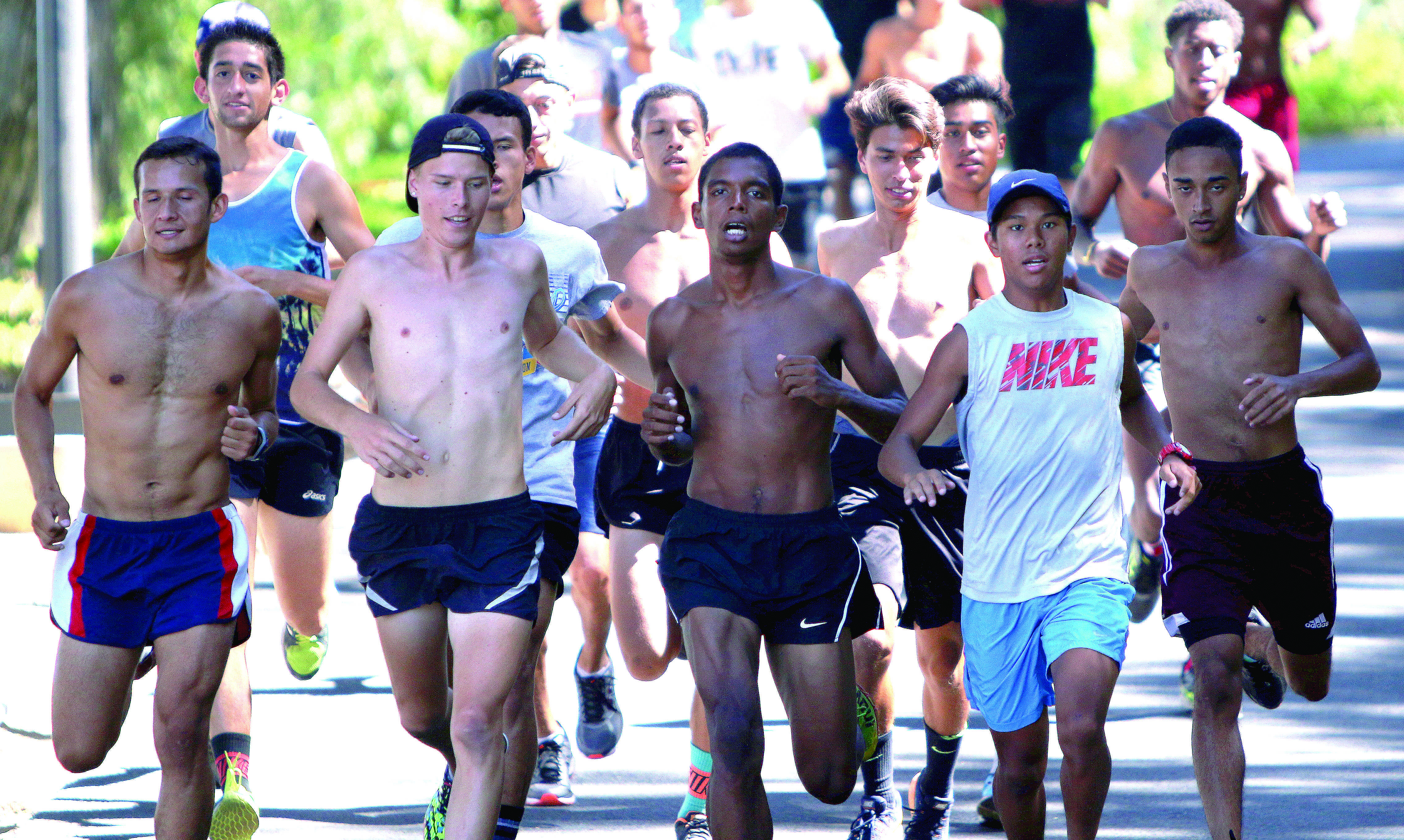 Men’s cross country team practice near Wheelock Stadium on Sept. 15.