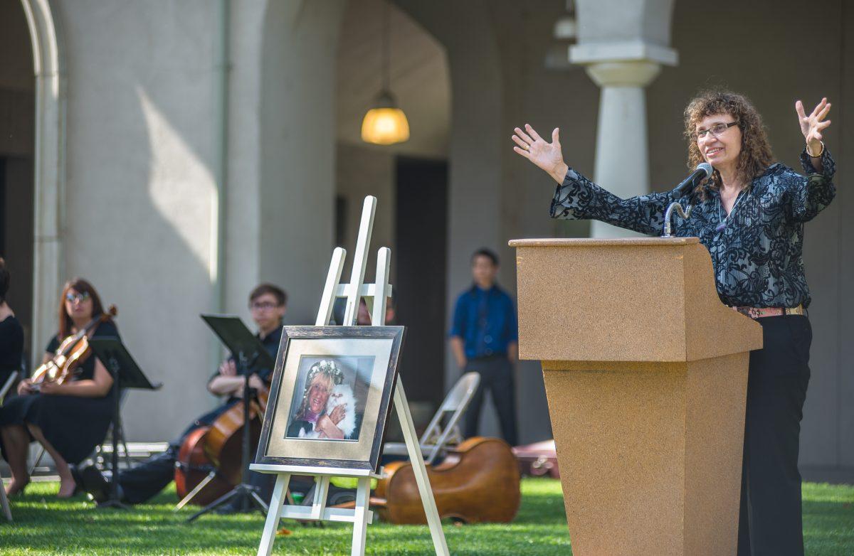 Daughter of Jan Schall, Laura Schall shares  stories of her mother in the Quadrangle Oct. 15 during Schall's memorial service. Schall who died July 2, at the age of 75, was the founder and director of the Study Abroad Program at the college for over 25 years.