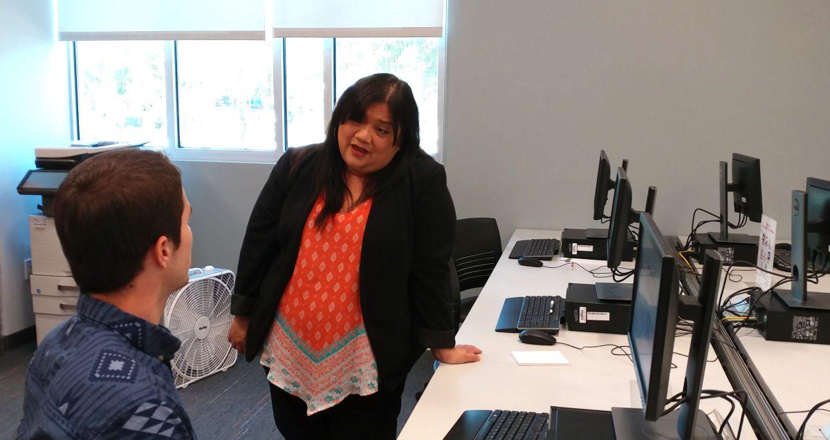 Pathways Outreach Supervisor Delia Tijerina assists a Riverside City College student in the     Welcome Center located in the Dr.Charles A. Kane building  on Nov. 14. (Chris Edson | Viewpoints)