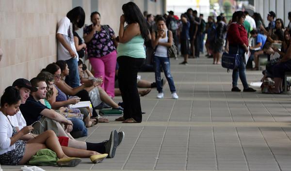 Riverside City College students wait outside math classes some waiting to add a class at RCC Wednesday in Riverside, CA. August 29, 2012.