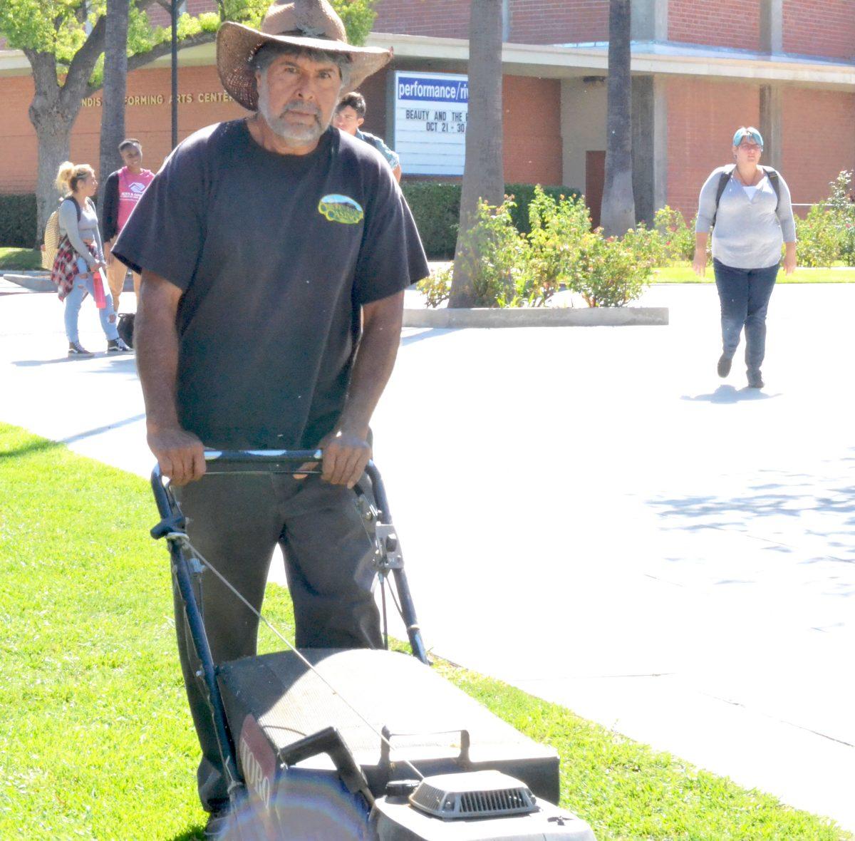 Groundsperson Miguel Arias looks upon  the Riverside City College grounds during his lunch break
Chris Edson | Viewpoints