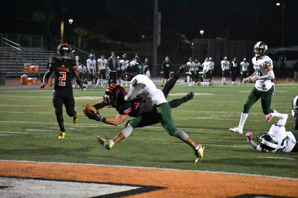 Riverside City College running back Erik Buchanan dives short of the one yard line against the Grossmont Griffens at Wheelock Stadium on Oct. 13.

Angel Pena | Viewpoints