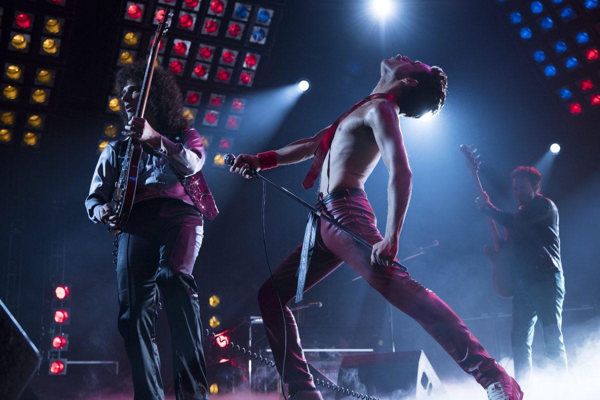 DF-11915_R2 – L-R: Gwilym Lee (Brian May), Rami Malek (Freddie Mercury), and Joe Mazzello (John Deacon) star in Twentieth Century Fox’s BOHEMIAN RHAPSODY. Photo Credit: Courtesy Twentieth Century Fox.