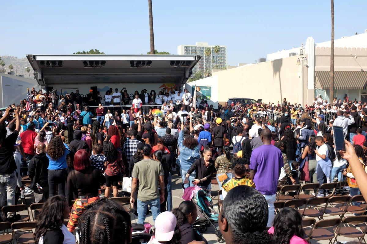 (Photo: Diego Lomeli | Viewpoints) Crowds gather to watch hip-hop dancers, cheer leading teams and marching bands perform at the 41st Annual Black History Month Parade.