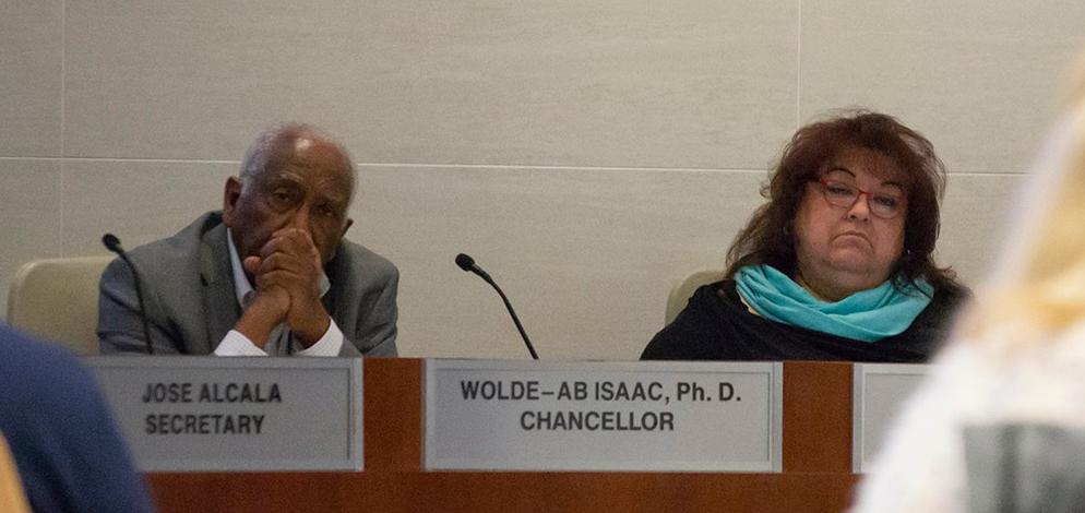 Chancellor Wolde-Ab Isaac, left, and president of the Board of Trustees Mary Figueroa listen to faculty concerns about the recent closure of all Riverside Community College District campuses. The Special Board meeting, held March 14, discusses the next steps in the transition to online instruction. (File photo, Leo Cabral | Viewpoints)