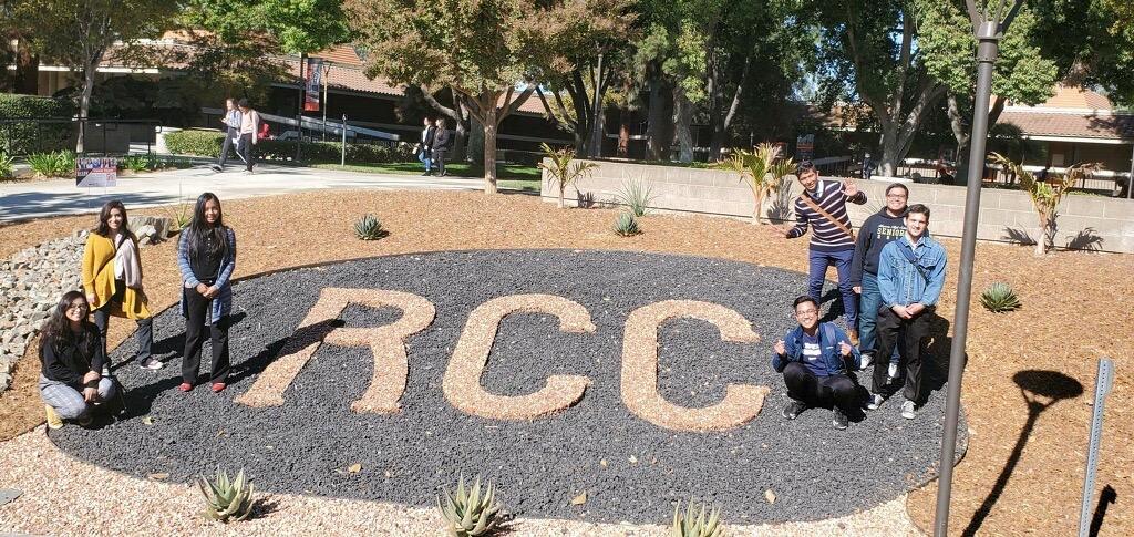 Members of Riverside City College's Elohist Club out by the old Admissions and Records Building. The club is established in over 50 colleges worldwide.