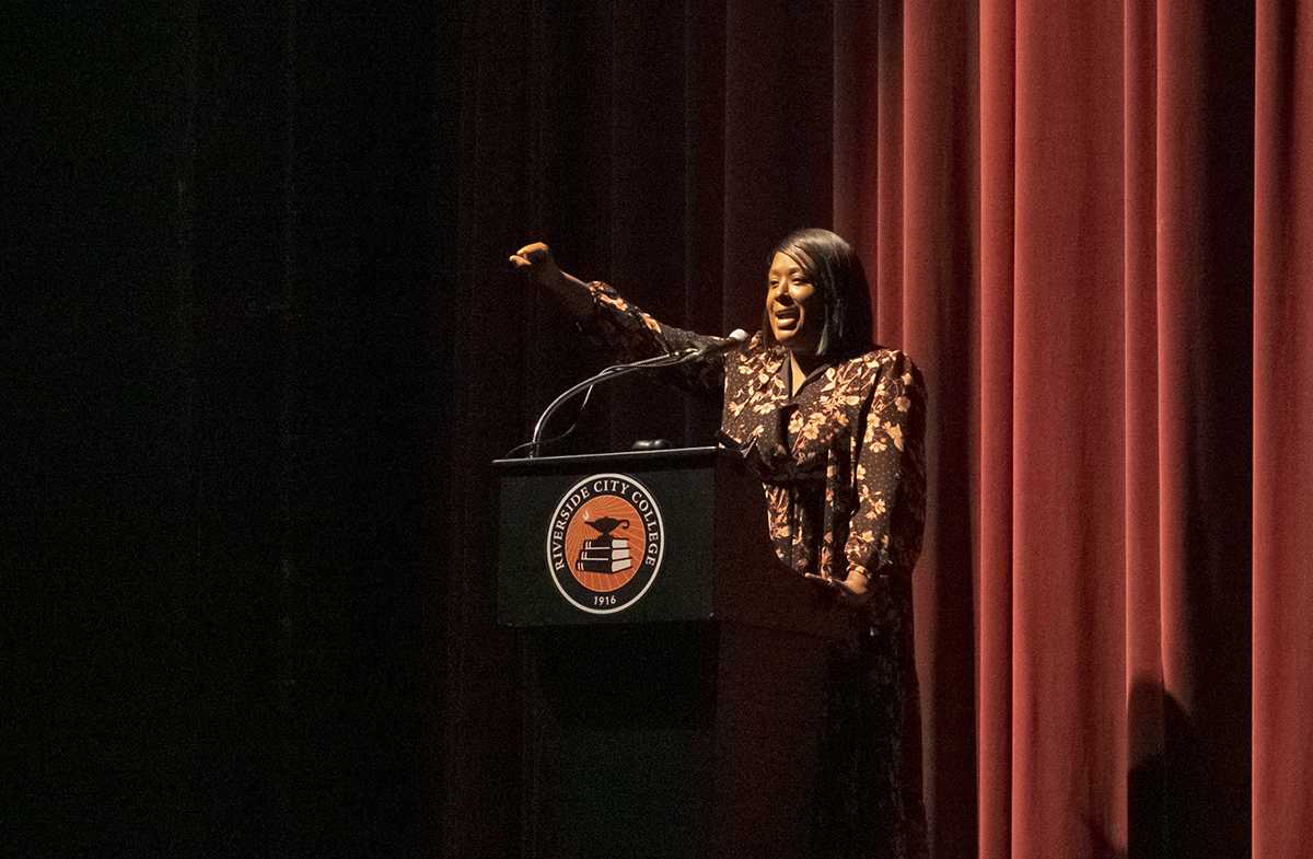 Author Nisha Elliot teaches young women about confidence and self-esteem during the Empowering Young Women's Conference at Riverside City College on March 7.