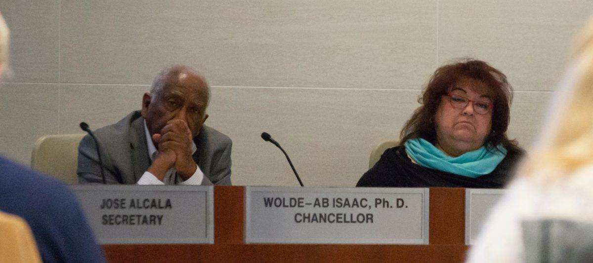 File photo of Wolde-Ab Isaac and Mary Figueroa at a Board of Trustees meeting March 14. (Leo Cabral | Viewpoints)