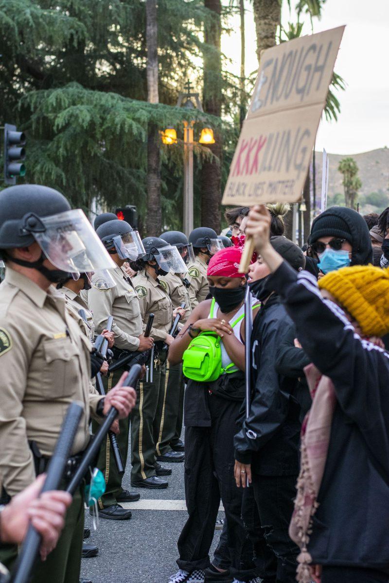 Protesters march against racial violence by the thousands in downtown Riverside