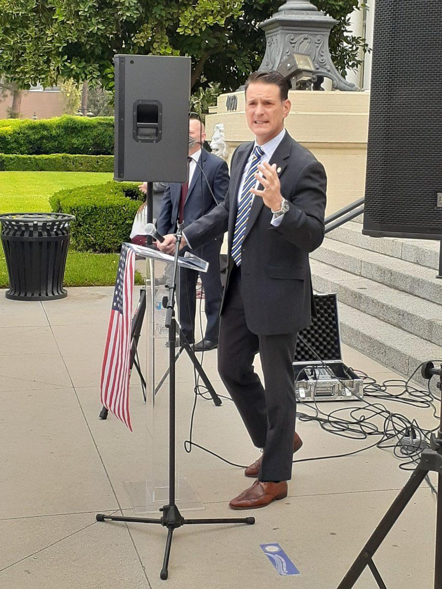 Riverside County District Attorney Mike Hestrin speaks at a Blue Lives Matter rally outside the Historic Courthouse in downtown Riverside on Sept. 12.