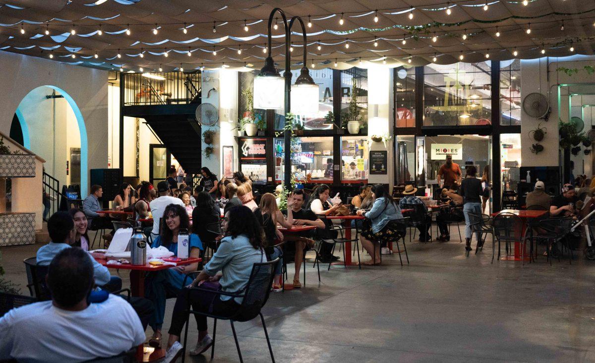 Patrons eat an array of meals in the patio area of the Food Lab in downtown Riverside on April 3. (Daniel Hernandez | Viewpoints) 