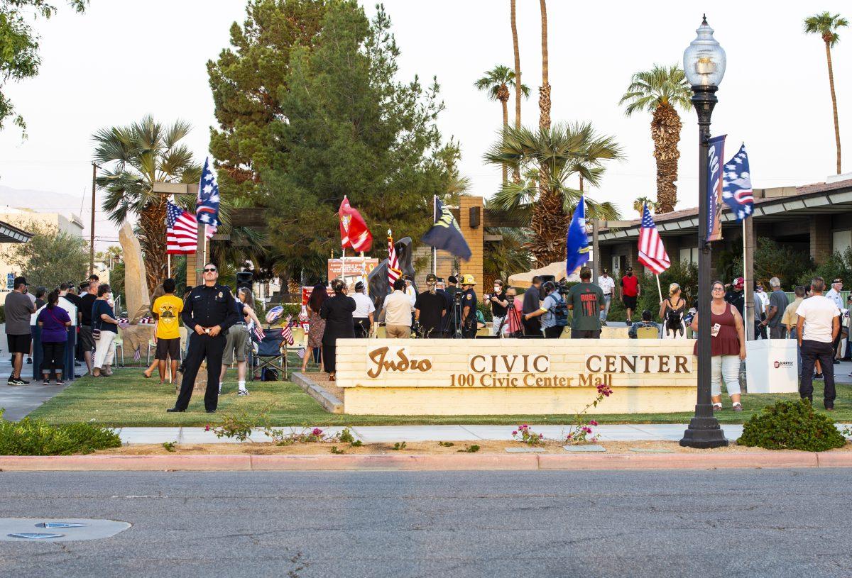 The Coachella Valley community gathers at Indio City Hall Sept. 8 to mourn the loss of U.S. Marine Cpl. Hunter Lopez and others who died at the airport suicide bombing in Kabul Aug. 26 this year. A bell rings once for each of the 13 U.S. service members who gave their lives that day. The candlelight vigil also honored U.S. Marine Cpl. Lance Salvador Lulu, another Coachella Valley native, who was injured in the airport attack. (Joyce Nugent | Viewpoints)