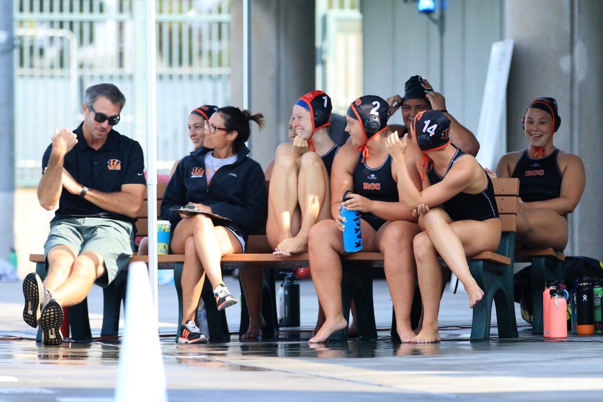 The Riverside City College's women's water polo team sit down with their coaches after playing a game. (Photo courtesy of Rich Laffelmacher)