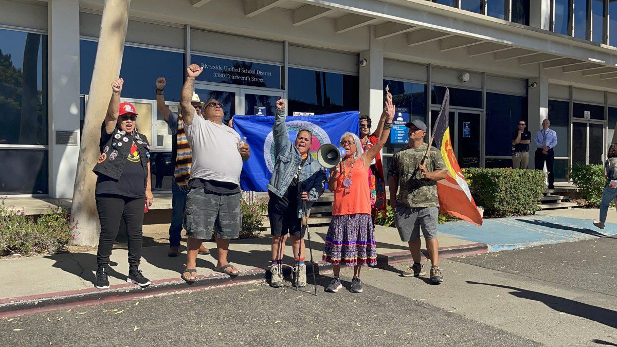 From left, Dee Dee Manzanares Ybarra, Herón Carillo, Misty Morning Dunn Rojo Alvarez, Judy Rojo and Xochyotl protest in front of the Riverside Unified School District office Oct. 28. (Jennipher Vasquez | Viewpoints)