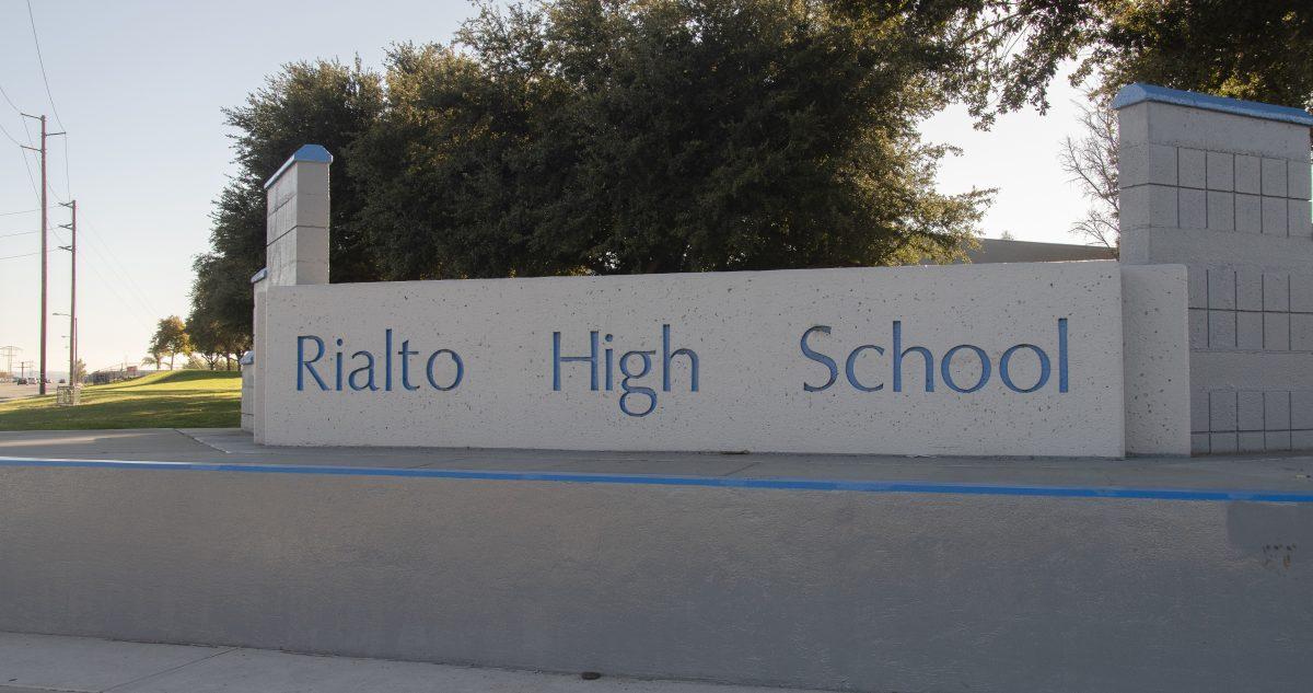 The Rialto High School name engraved in stone faces the Pepper Avenue and Mill Street intersection. The high school was established in September 1992. (Leo Cabral | Viewpoints)