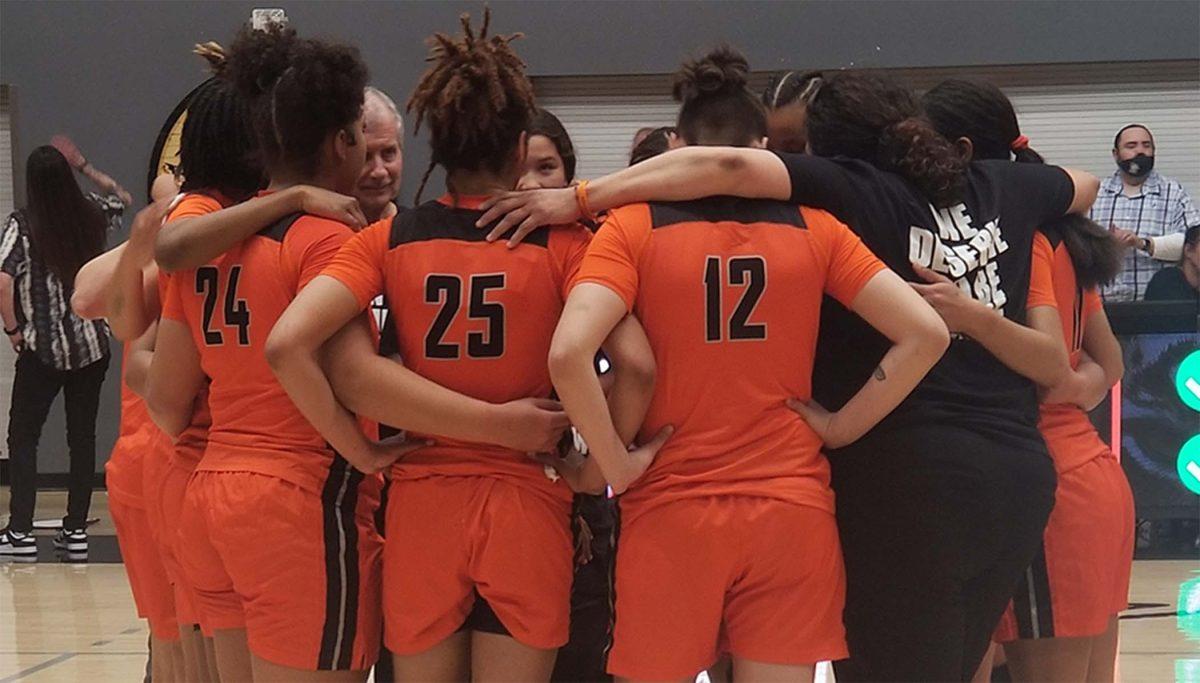 Riverside City College women's basketball team groups in unison as Tigers come short to Orange Coast in final regular-season home game. 66-64 (Daesha Gear | Viewpoints)