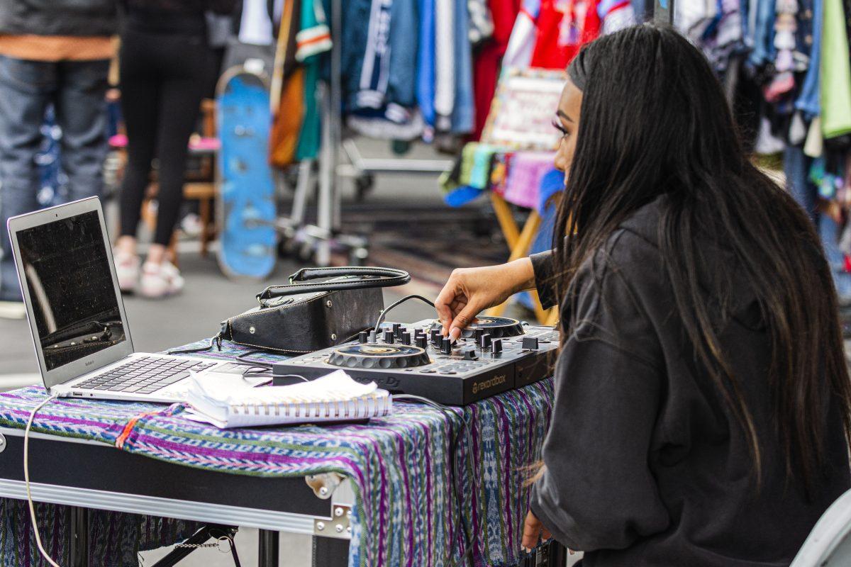 Katrina Gomez, @goodiespopup, organizes and runs popups through out the Inland Empire and creates the vibe with music at the Goodies Popup in Downtown Upland on April 2. Photo by Stephen Day, Viewpoints.