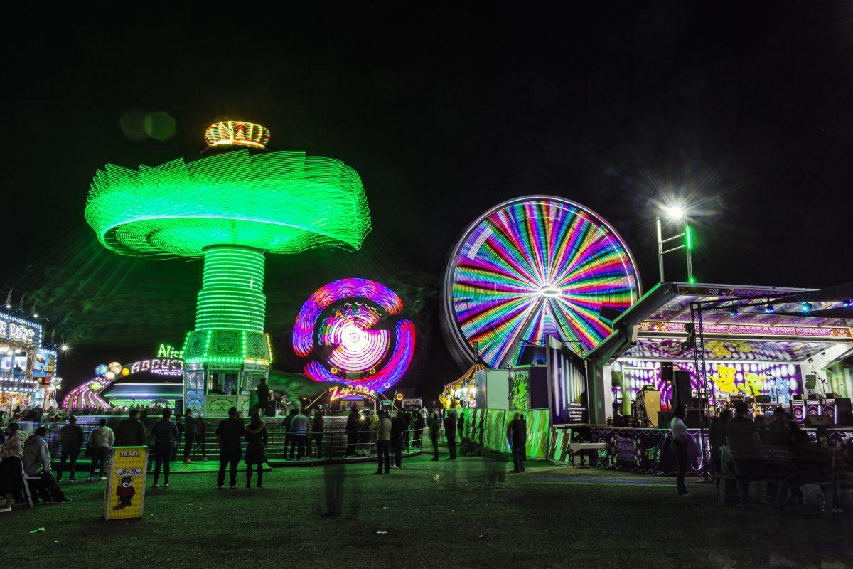 At night the rides light up and fairgoers wander about enjoying the light show from the various rides at the inagural Rubidoux Spring Break Spectacular on March 20.

Helm and Sons Amusement partnered with the nonprofit Jurupa Valley Children's Christmas Party for the week long fair which runs March 18 - 27.. Photo By Stephen Day, Viewpoints.