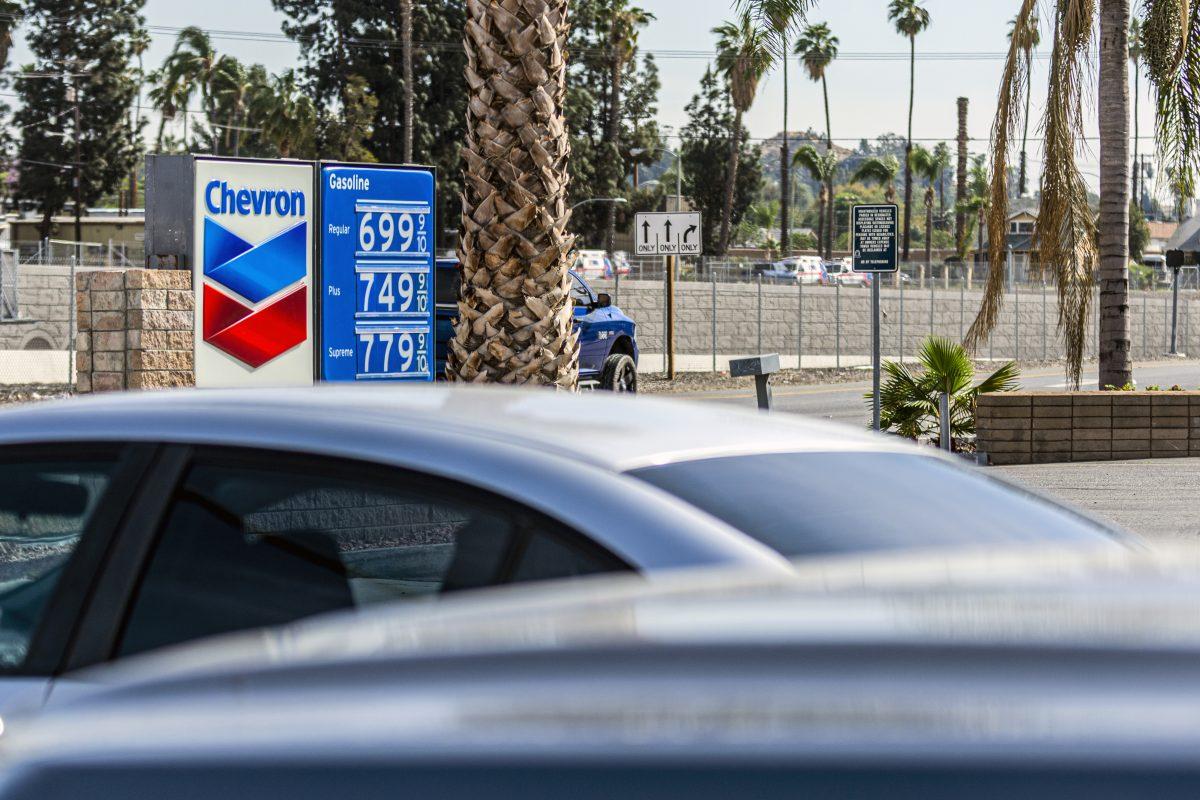 A sign at the Chevron on 14th street and the 91 Freeway shows prices starting at 6.99 p/gal on March 25. Gas prices have surged for the last several weeks following Russia's invasion of Ukraine.  Photo by Stephen Day, Viewpoints.