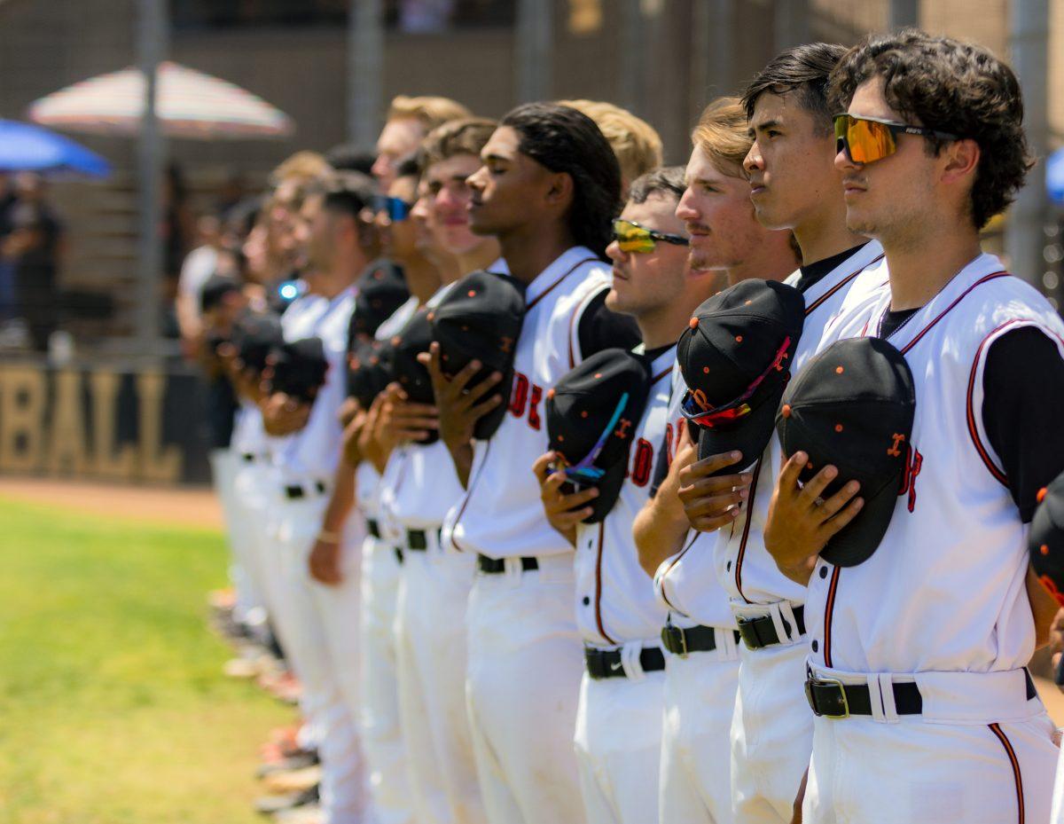 Riverside City College Tigers Baseball team line up for the National Anthem as game three of the Southern Regional round two is about to start. Tigers would go on to defeat the Cypress Chargers 10-5 on May 15.  (Stephen Day |Viewpoints)