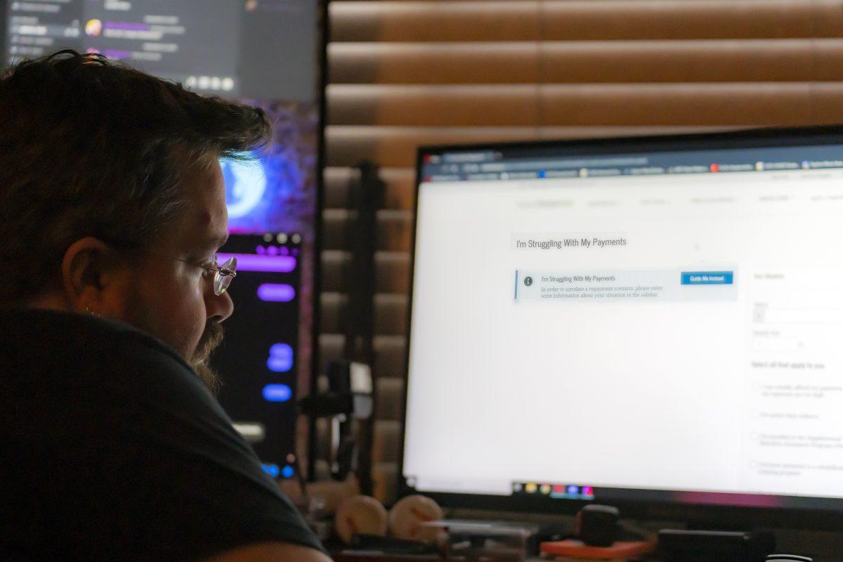 A college student researches options on student loan repayment.

Photo by Stephen Day, Viewpoints