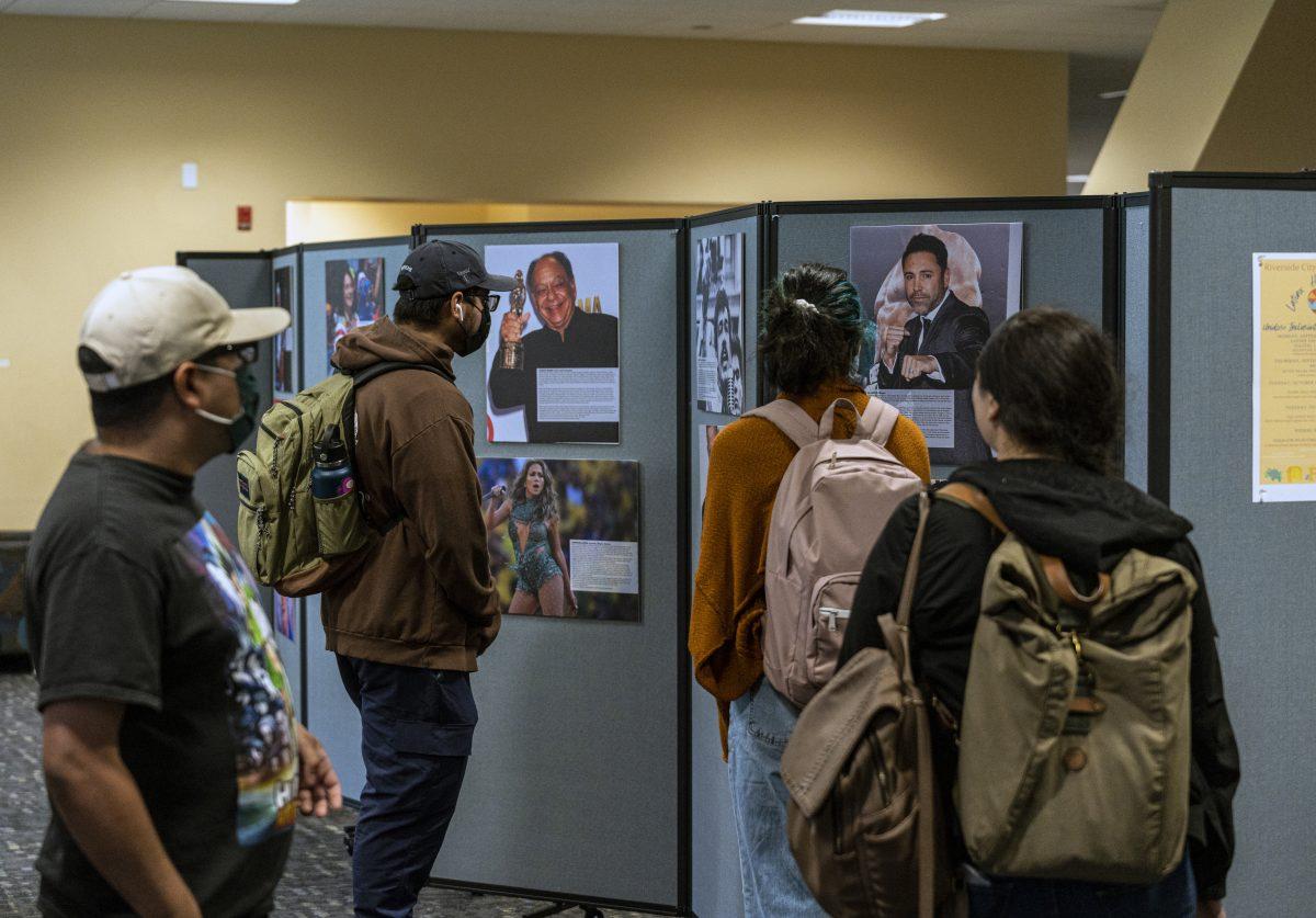 Students enjoy the Latinx Art Gallery for Hispanic Heritage month in the Digital Library on Sept 14.

The gallery featured write ups on artists like Jennifer Lopez and Cheech Marin who recently opened "The Cheech" in downtown Riverside.

Photo by Stephen Day, Viewpoints.