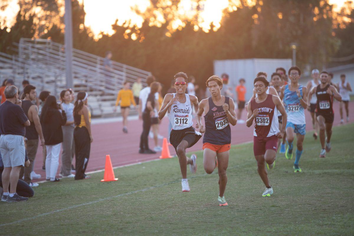 Men's and Women's cross country teams post personal bests at the John Elders Titan Invitational