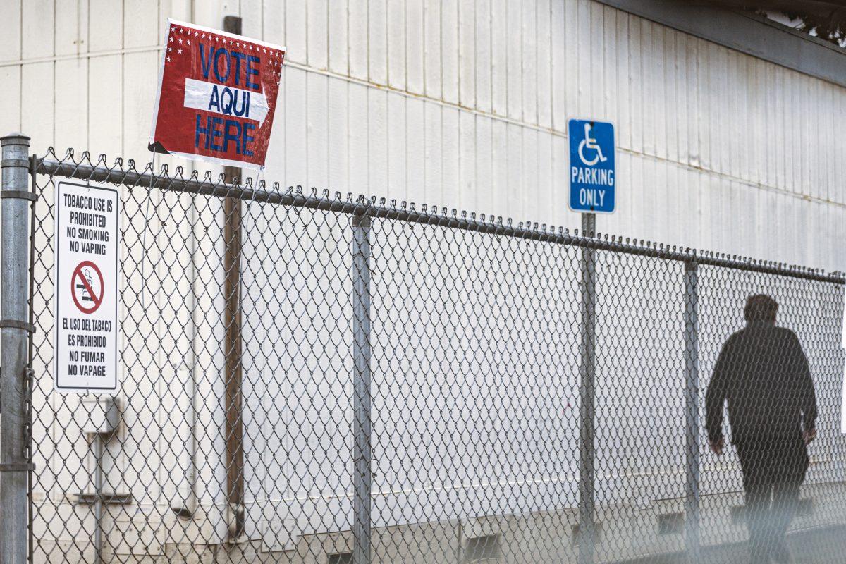 A voter braves the cold and rainy election day to come out and vote in the 2022 midterm elections at Orrenmaa Elementary School on Nov 8.

Stephen Day | Viewpoints