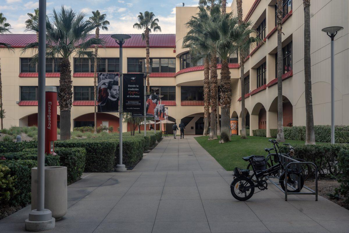 Two students walk through the typlically bustling area of campus between the Math and Science building and the Digital Library at Riverside City College on Dec 5.

Photo by Stephen Day, Viewpoints.