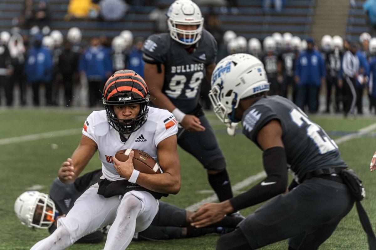 Rosahawn Lacy tries to break through the Bulldogs defensive line.

The Tigers were defeated 55-0 at College of San Mateo against the Bulldogs on Dec 11.

Photo by Stephen Day, Viewpoints.