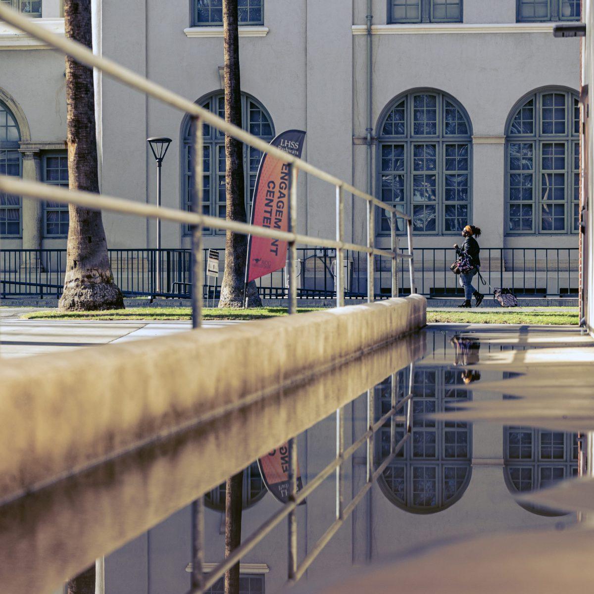 A lone student walks by the Quadrangle building at Riverside City College on Nov 9.

Low enrollments has left the campus less populated than usual.

Photo by Stephen Day, Viewpoints.