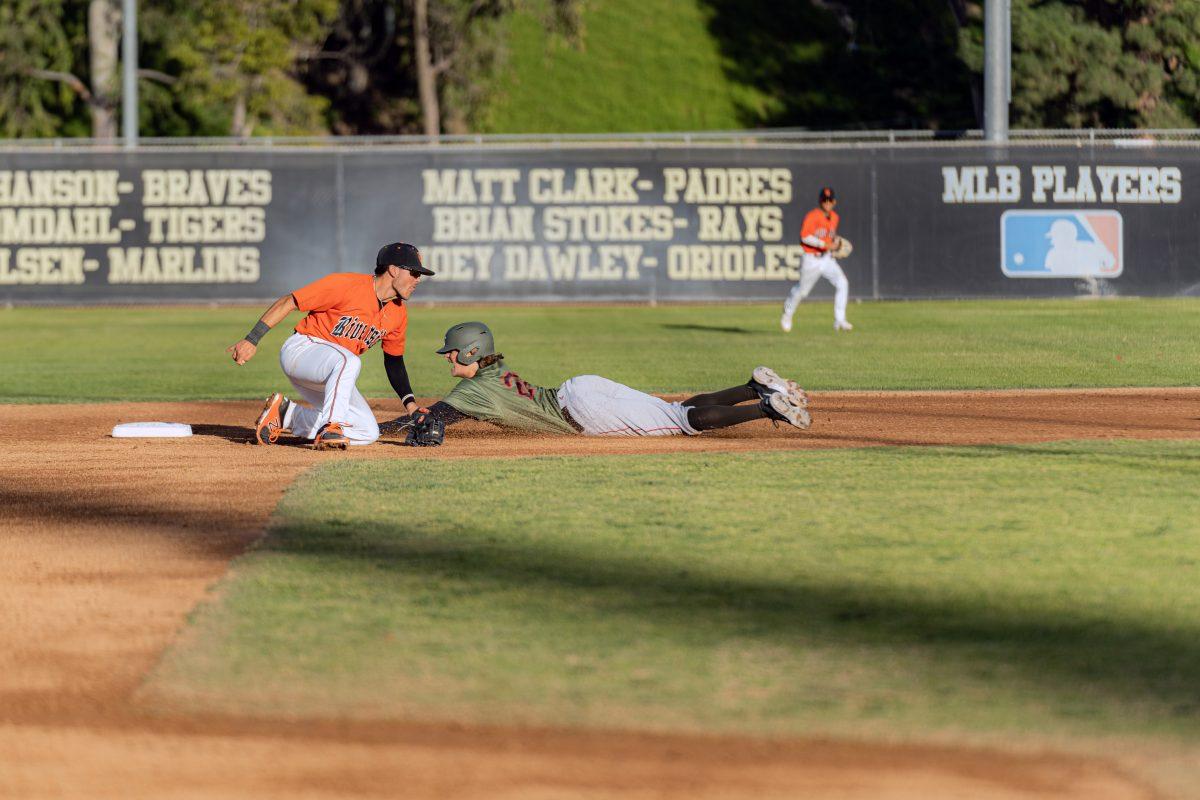 Tigers Infielder Beau Betten tags the runner out at second base during their game against the Palomar Comets.

Tigers lost 7 - 1.

(Photos by Stephen Day | Viewpoints)