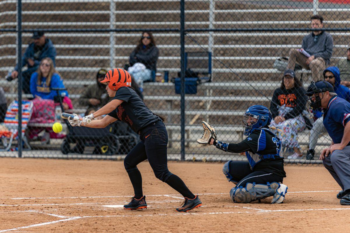 Tigers Infielder Sarah Franco-Colis bunts in the first inning, advancing the runner, during the Feb. 2 game against Allan Hancock College Bulldogs.

Tigers won 13 - 8.

(Photos by Stephen Day | Viewpoints)