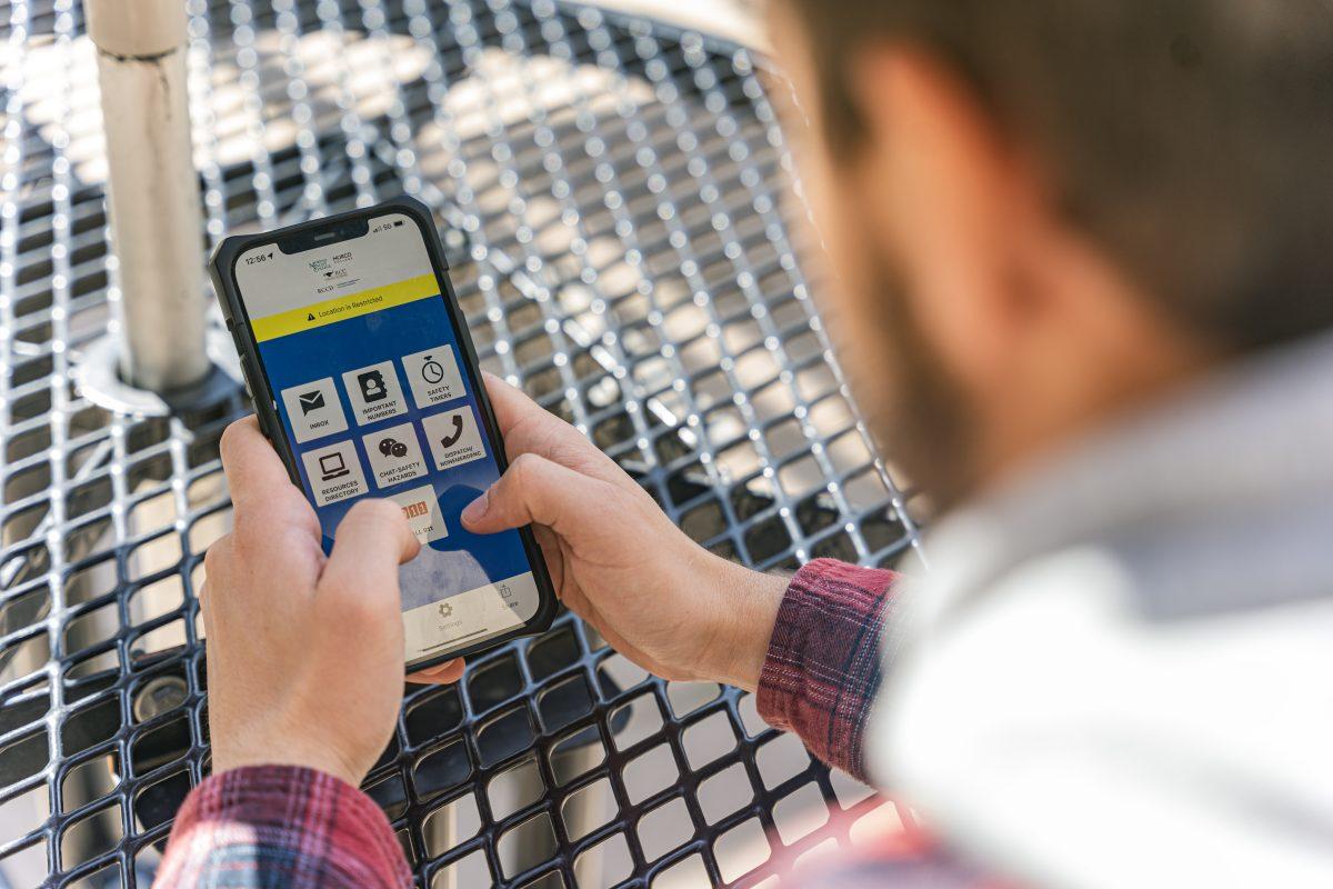 A Riverside City College student looks at the Rave Guardian app, one of the methods that the school uses to send out mass messages to students in emergencies.

Photo by Stephen Day, Viewpoints