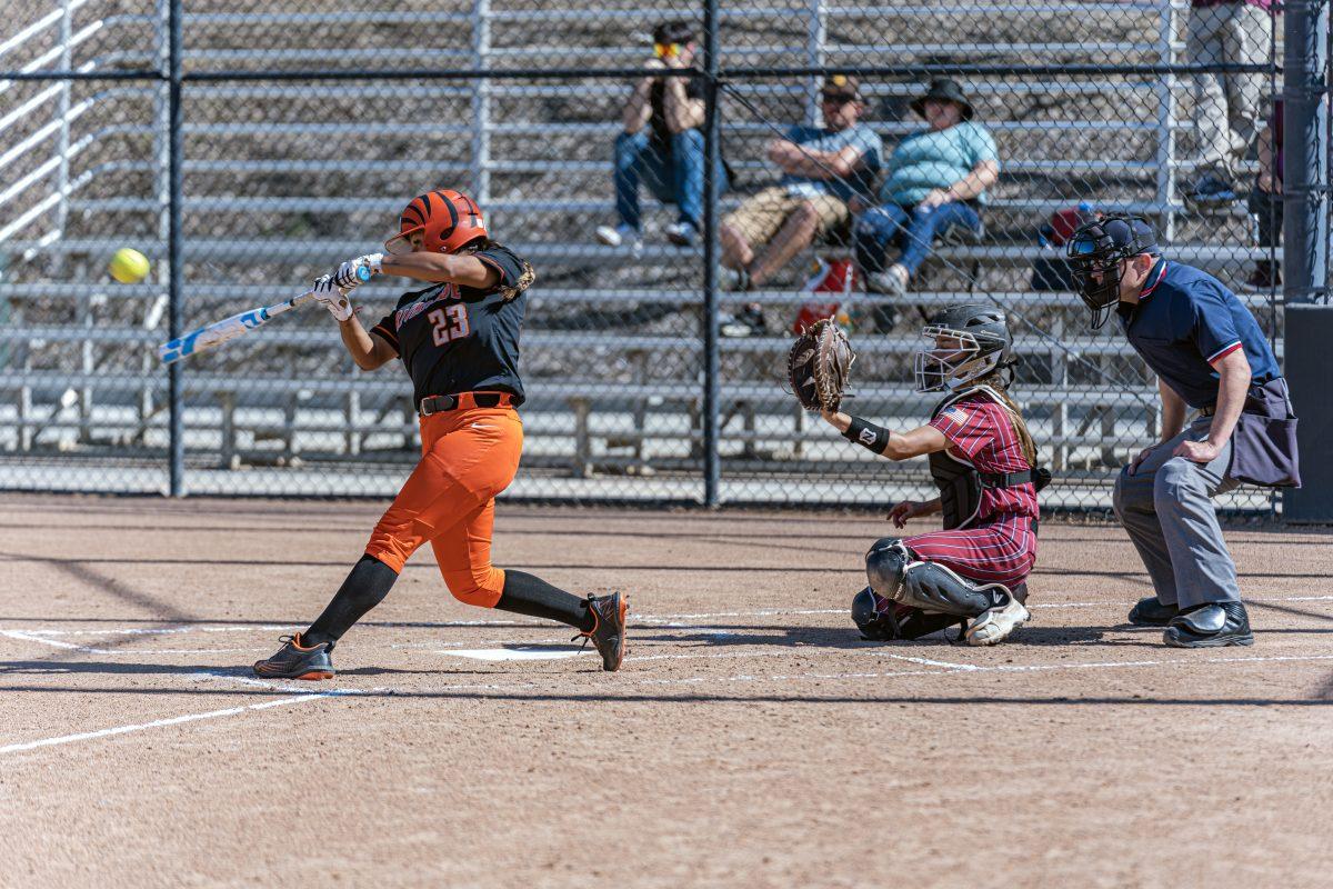 Tiger Sophia Franco-Colis knocks one past the infield to get on base during the game against San Diego City Knights at Riverside City College on March 28.

Tigers defeated the Knights 7-1.

Photo by Stephen Day, Viewpoints.