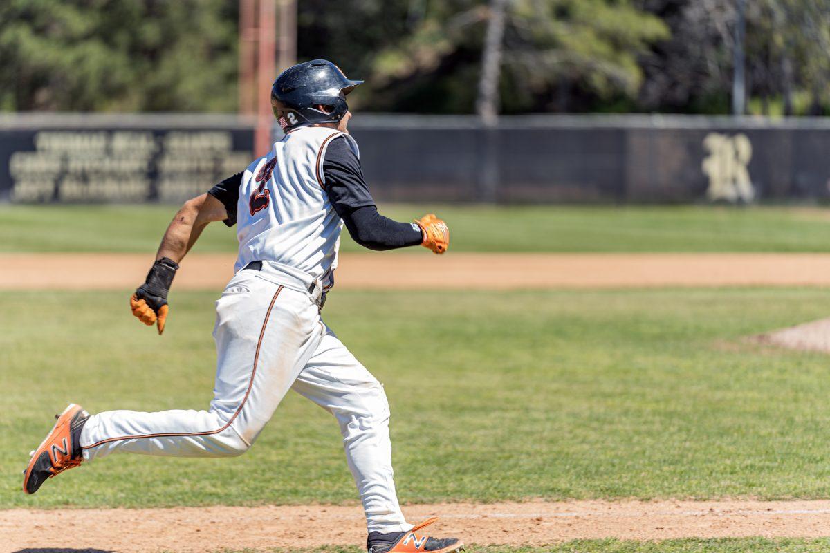 Riverside City College Tiger Bryce Cermenelli rounds third and heads home for the score during the game with the Cypress College Chargers.

Photo By Stephen Day, Viewpoints