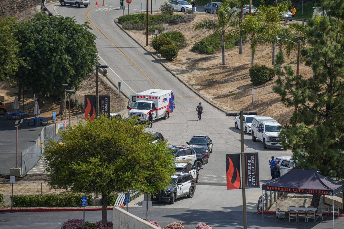 Police and EMT station themselves at the entrance to the lawn area in front of the Riverside City College Child Development Center where a suspect armed with a knife is hiding in the storm drain.  The incident caused the college to shut down for nearly 3 hours.

No injuries came from the incident.

Photo by Stephen Day, Viewpoints