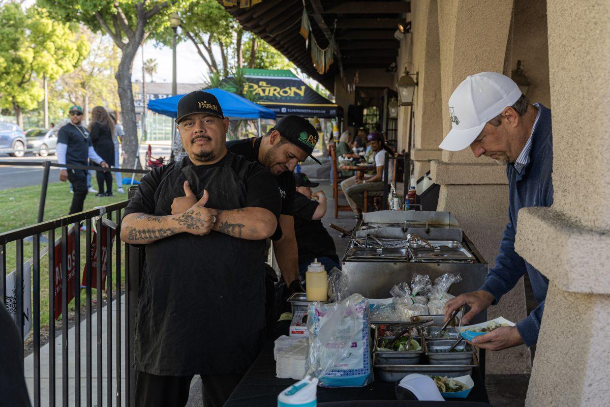 El Patrón's head chef, Juan Carlos Nuñez,  poses while manning the back end taco bar during the restaurant's Cinco de Mayo celebration at their downtown Riverside location on May 5. 